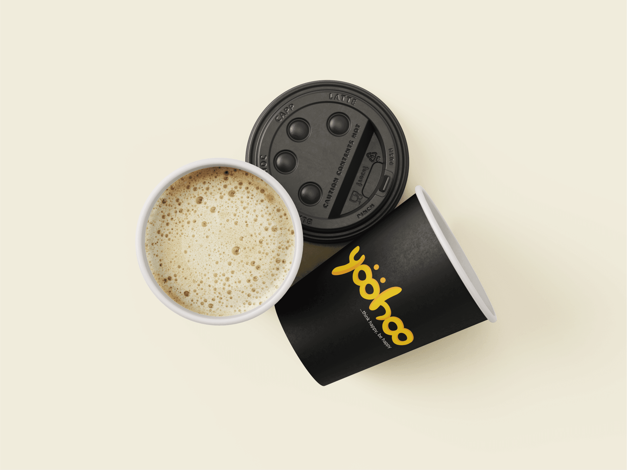Black takeaway coffee cup with the yellow YooHoo wordmark